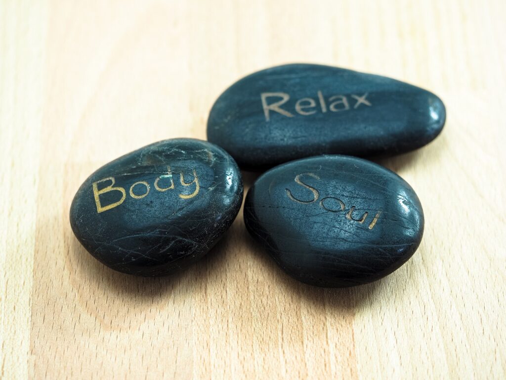 Three rocks with signify the Mindfulness Training principles of mind, body, and soul.